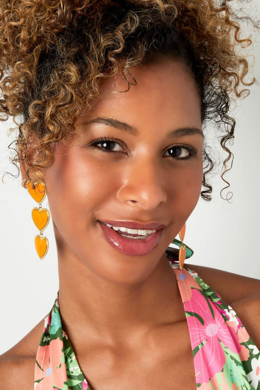 Oorbellen met oranje hartjes