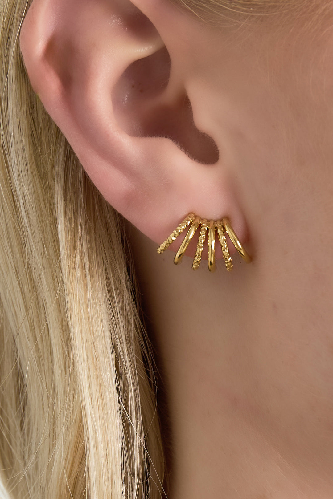 Oorbellen met reeks mini hoops - Goud